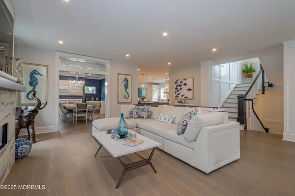 a large kitchen with a table and chairs