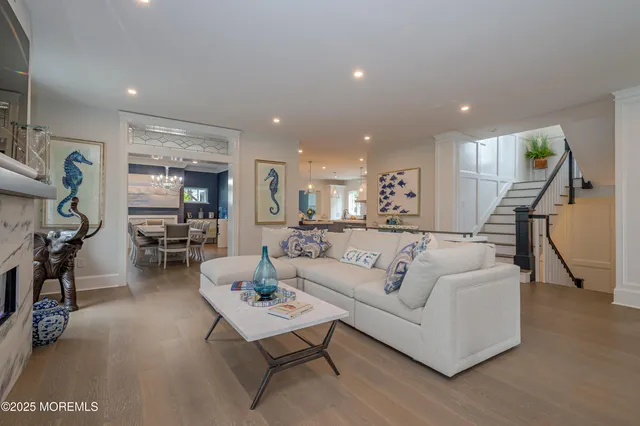 a large kitchen with a table and chairs