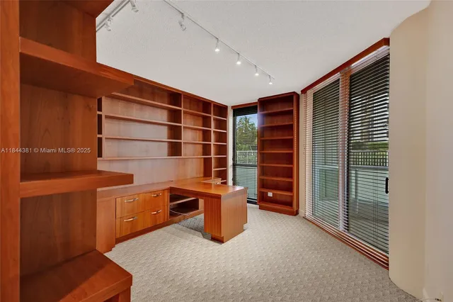 a bathroom with a shower and a toilet