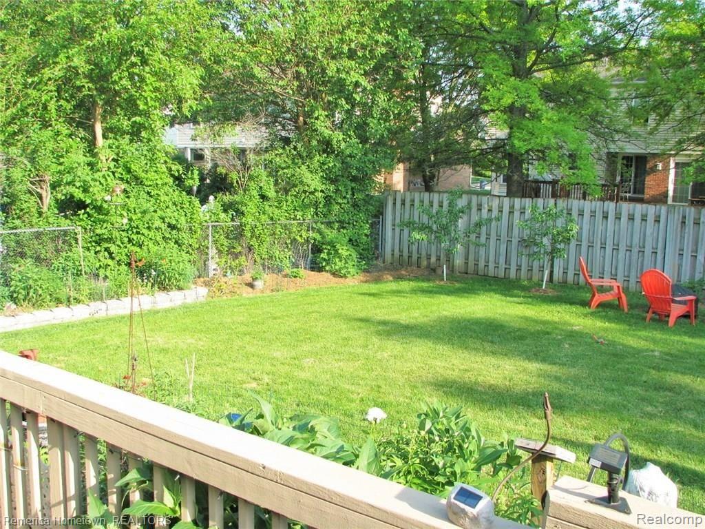 45695 Hanford Road Canton, MI 48187 - Photo 15 of 24 The back yard had privacy fencing on 3 sides with natural privacy on the 4th side. All the plants in the yard are Michigan native plants. This yard is a CERTIFIED MONARCH WAY STATION!! Very little water needed here!! A very low to zero maintenance Michigan native environment!