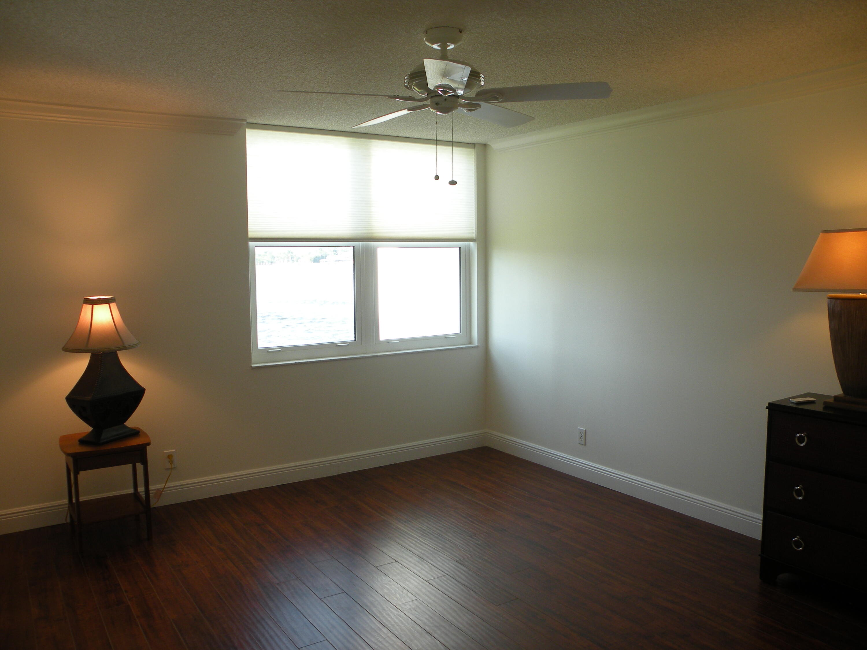 1950 Southwest Palm City Road Southwest, Unit 13203 Stuart, FL 34994 - Photo 21 of 29 Master Bedroom W/ View
