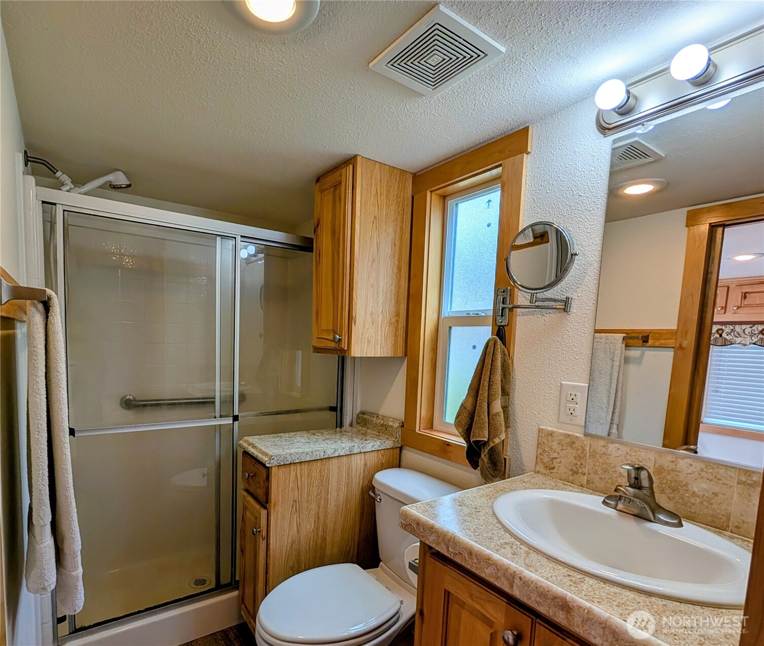 16 Copalis Rv Lane Copalis Beach, WA 98535 - Photo 13 of 39 a bathroom with a sink toilet and shower