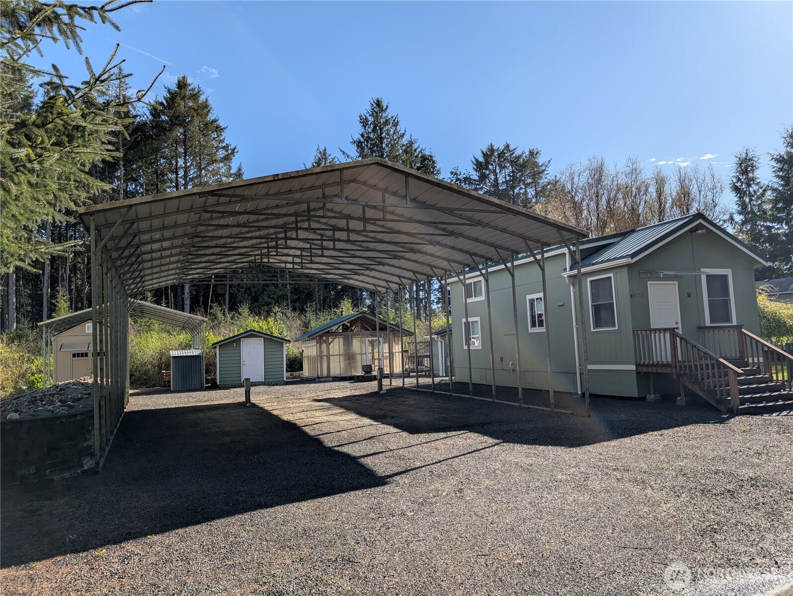 16 Copalis Rv Lane Copalis Beach, WA 98535 - Photo 2 of 39 a view of a house with a yard