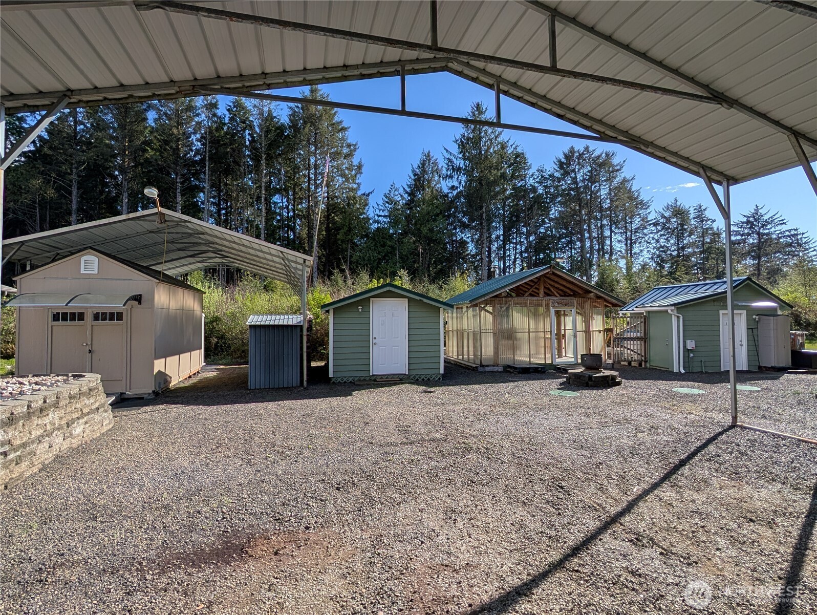 16 Copalis Rv Lane Copalis Beach, WA 98535 - Photo 21 of 39 a view of a house with a yard and sitting area
