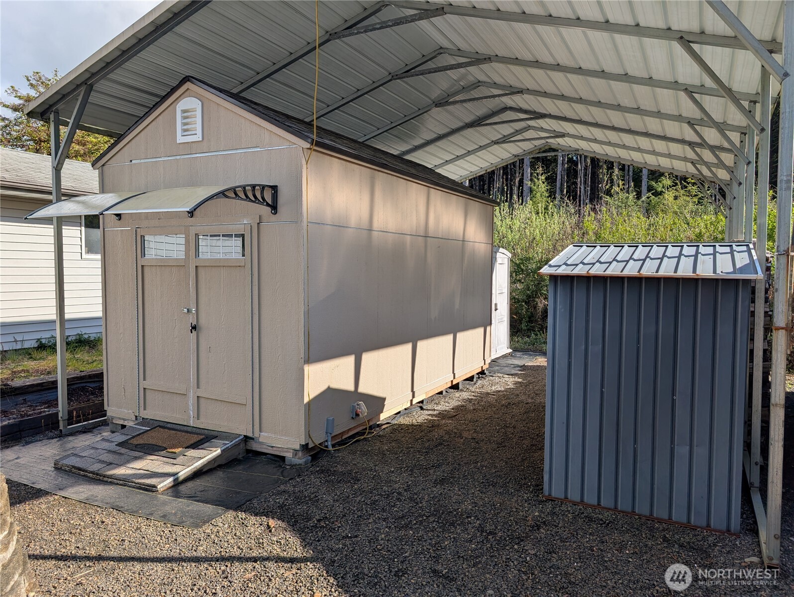16 Copalis Rv Lane Copalis Beach, WA 98535 - Photo 30 of 39 a house with trees in front of it