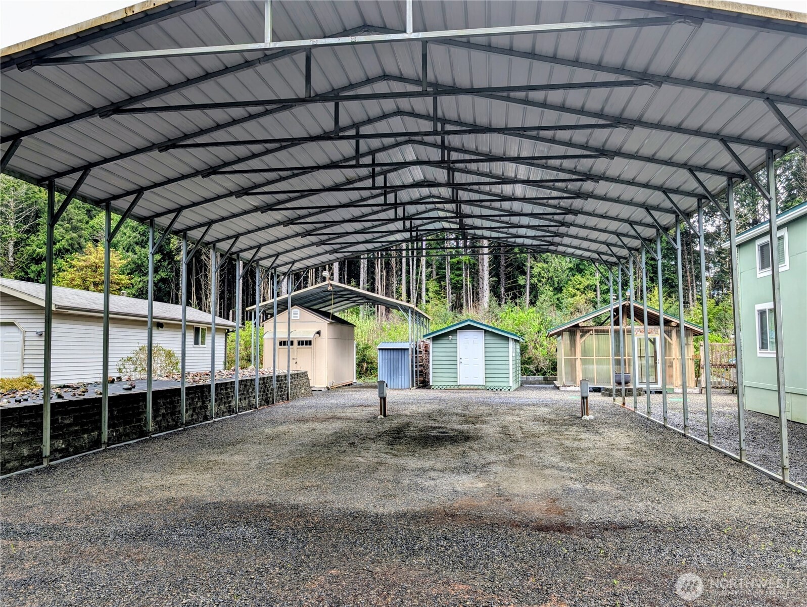 16 Copalis Rv Lane Copalis Beach, WA 98535 - Photo 3 of 39 a view of a house with a small yard