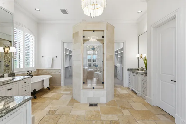 a kitchen with stainless steel appliances a stove top oven and cabinets