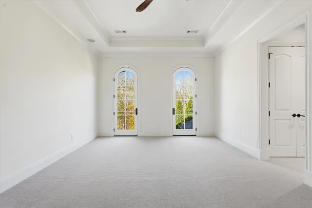 a bathroom with a glass door shower
