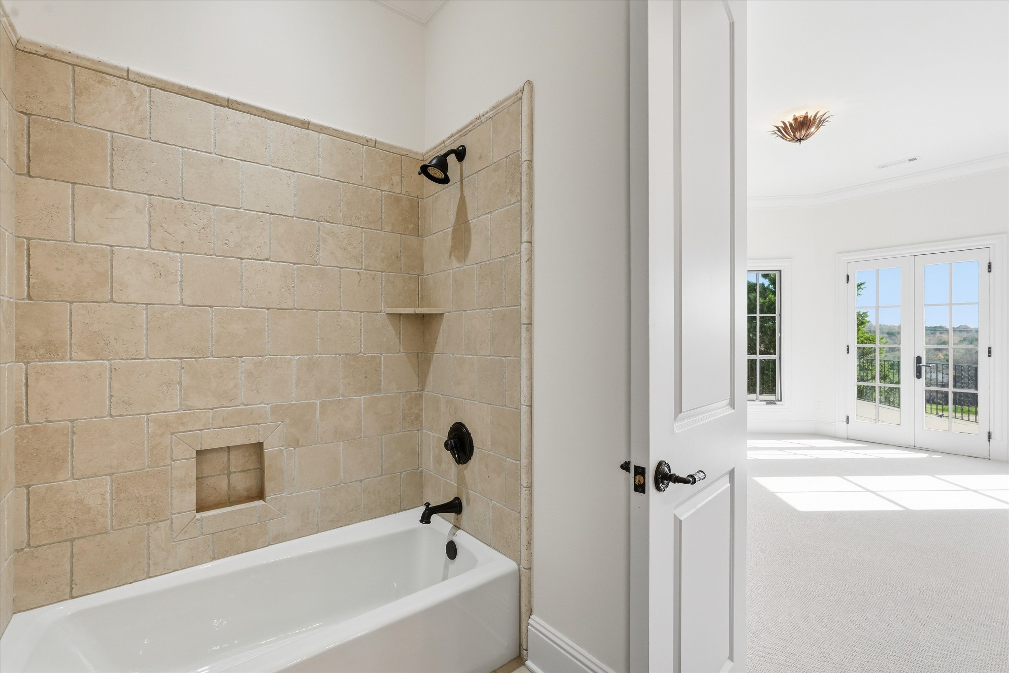 10 Colonel Winstead Drive Brentwood, TN 37027 - Photo 54 of 97 a bathroom with a bathtub and shower