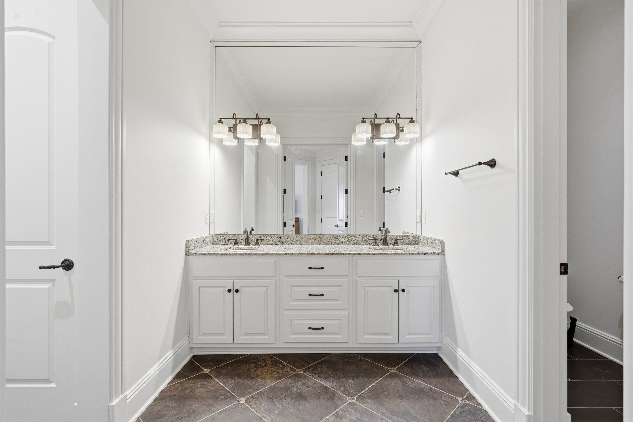 10 Colonel Winstead Drive Brentwood, TN 37027 - Photo 94 of 97 a bathroom with a granite countertop sink a mirror and a shower