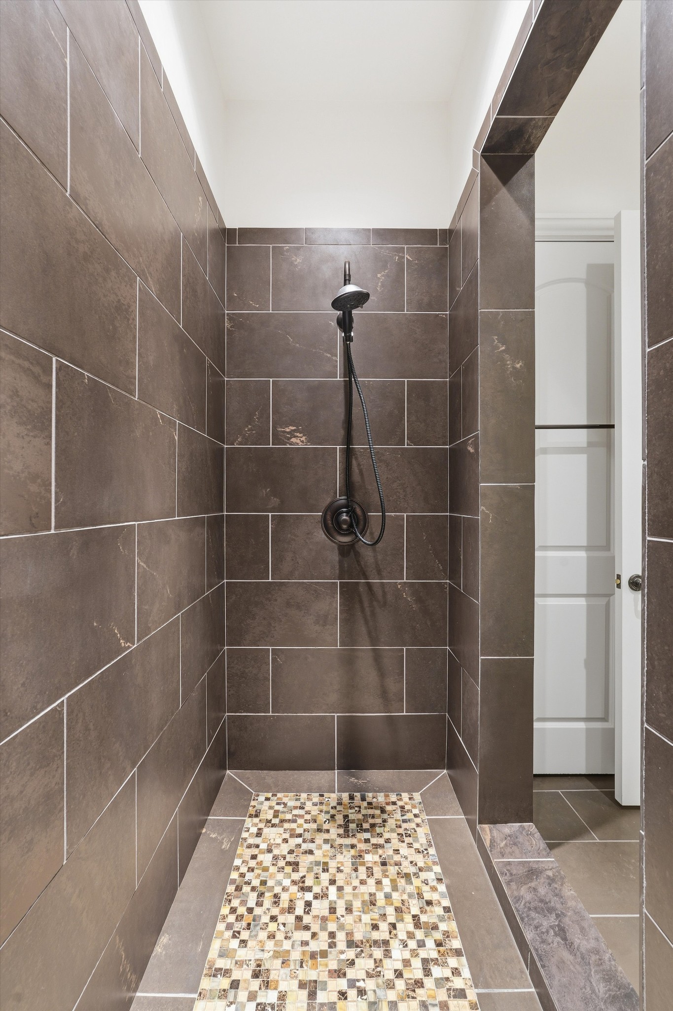 10 Colonel Winstead Drive Brentwood, TN 37027 - Photo 95 of 97 a bathroom with a glass door shower