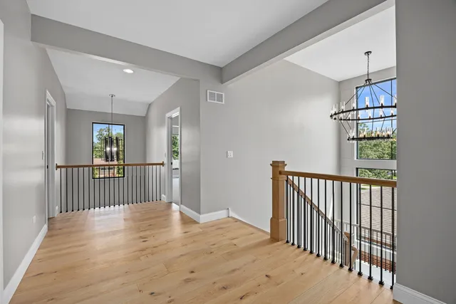 a view of entryway with wooden floor