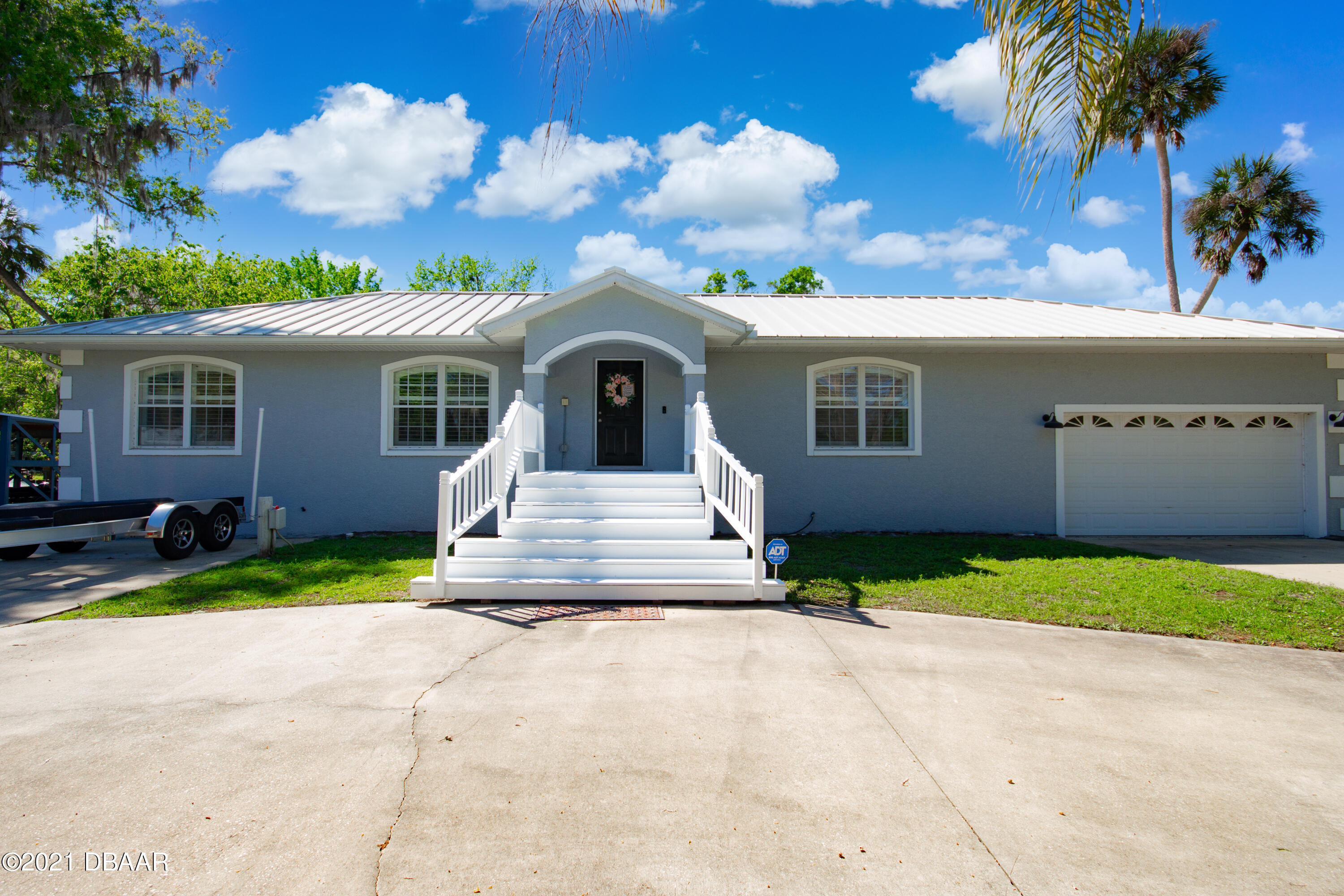 24940 Bartram Road Astor, FL 32102 - Photo 1 of 43 ext front angle