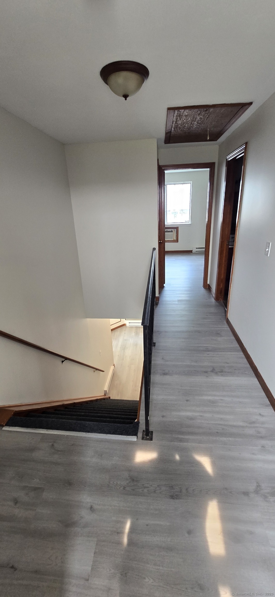 106 Wakelee Road, Unit 1 Waterbury, CT 06705 - Photo 11 of 19 a view of entryway and hall with wooden floor