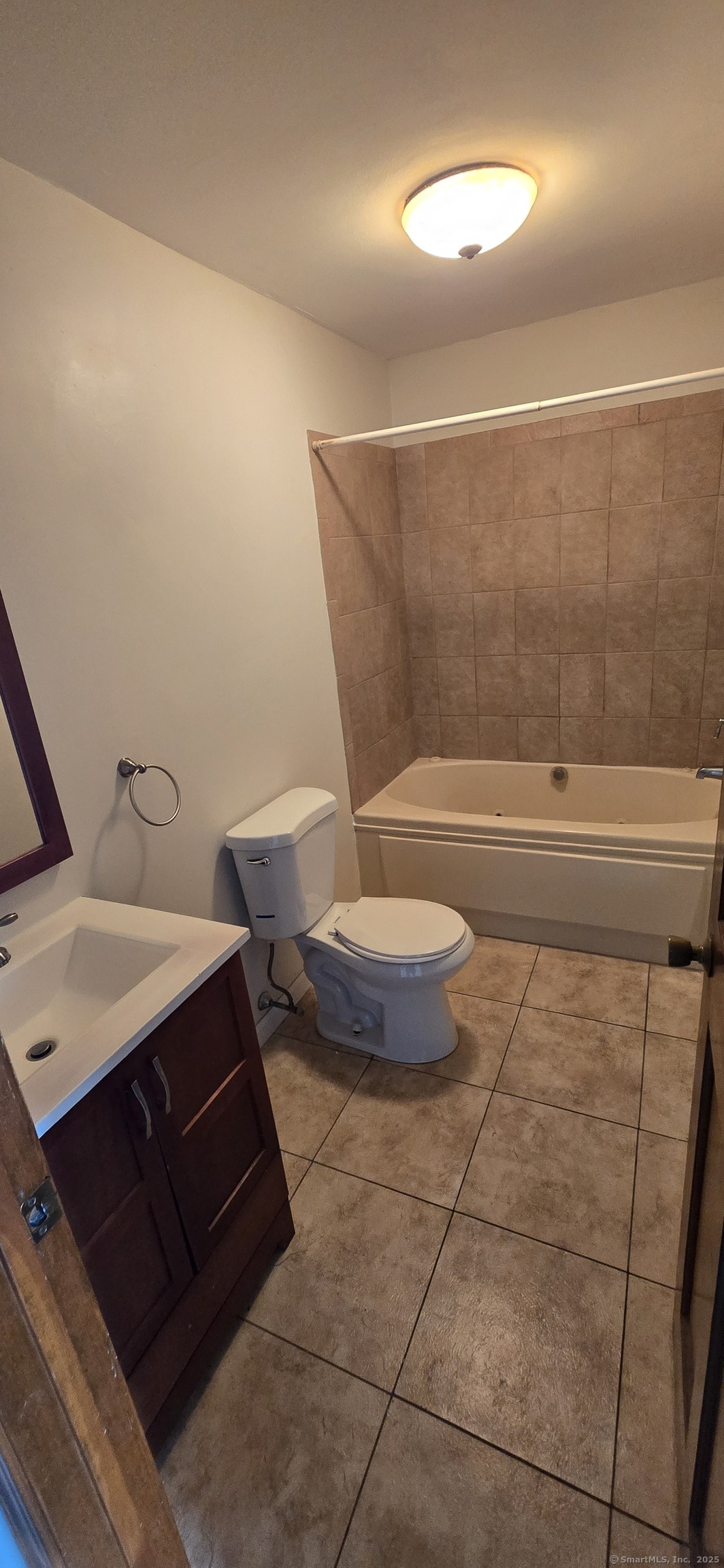 106 Wakelee Road, Unit 1 Waterbury, CT 06705 - Photo 14 of 19 a bathroom with a sink and a mirror