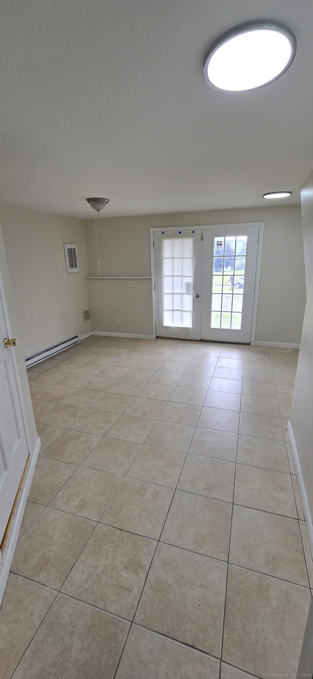 106 Wakelee Road, Unit 1 Waterbury, CT 06705 - Photo 19 of 19 a view of an empty room with a window