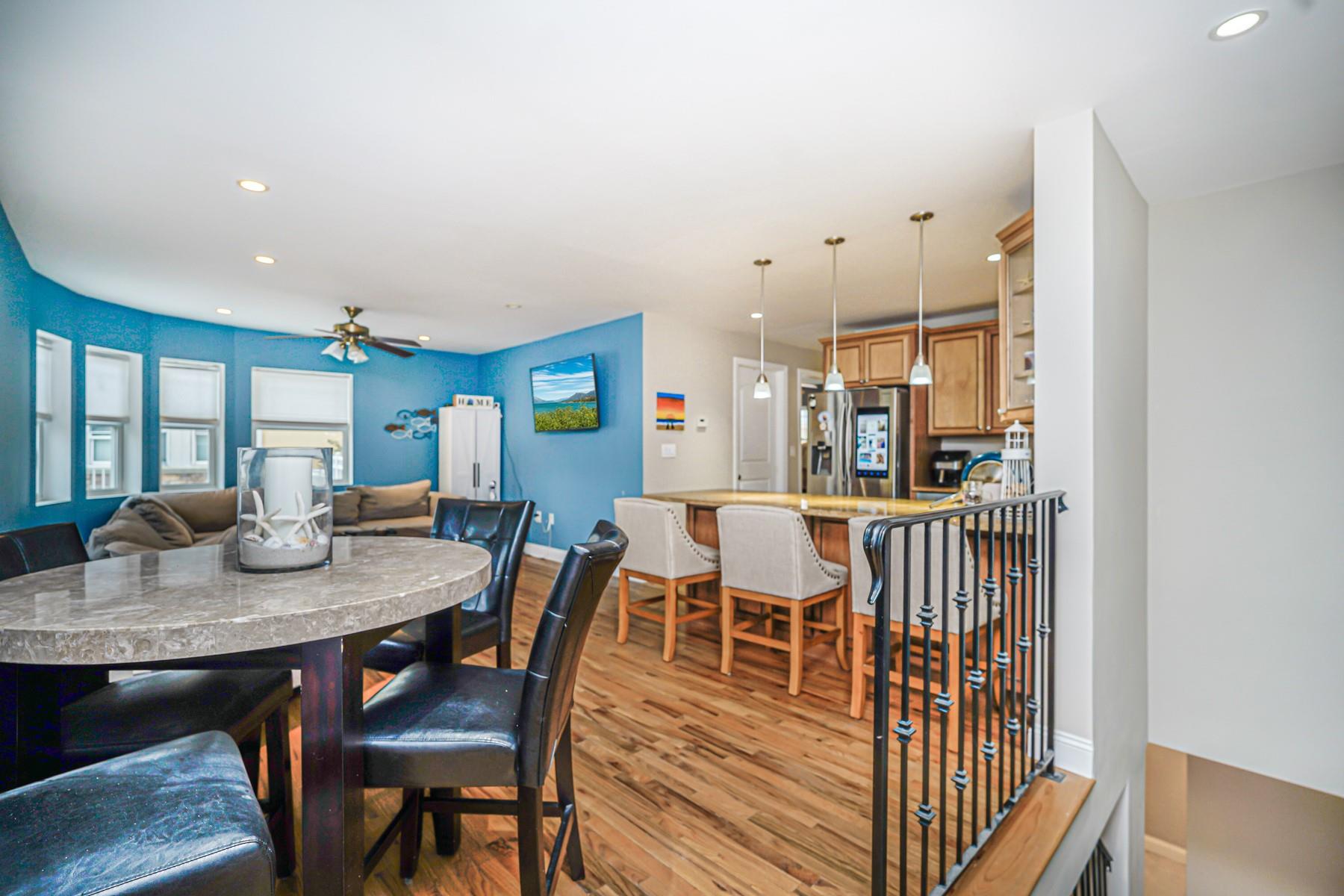 175 Beach 100th Street, Unit 8A Queens, NY 11694 - Photo 7 of 24 a dining room with furniture and window