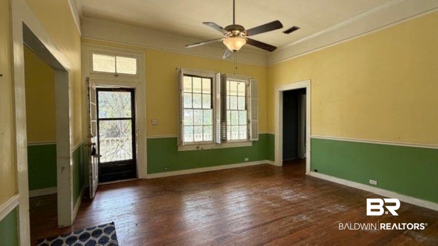 3006 Pleasant Valley Road Mobile, AL 36606 - Photo 11 of 20 Entrance foyer featuring a ceiling fan, dark wood-type flooring, and crown molding
