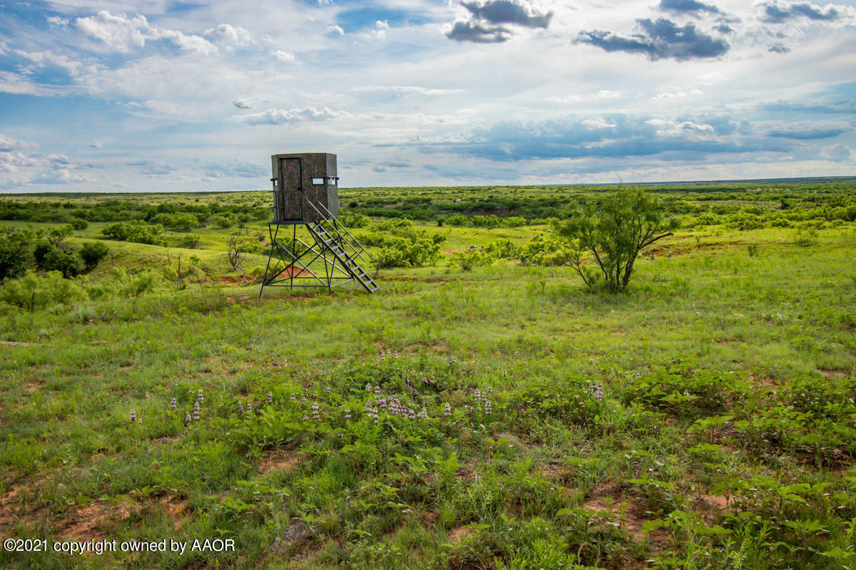 Ol' Glory Ranch Matador, TX 79244 - Photo 23 of 59 a view of a yard with an outdoor space