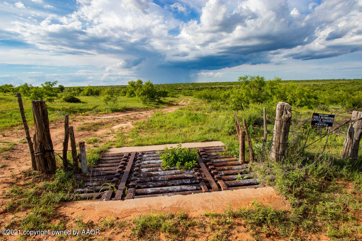 Ol' Glory Ranch Matador, TX 79244 - Photo 43 of 59 a view of a yard with wooden fence