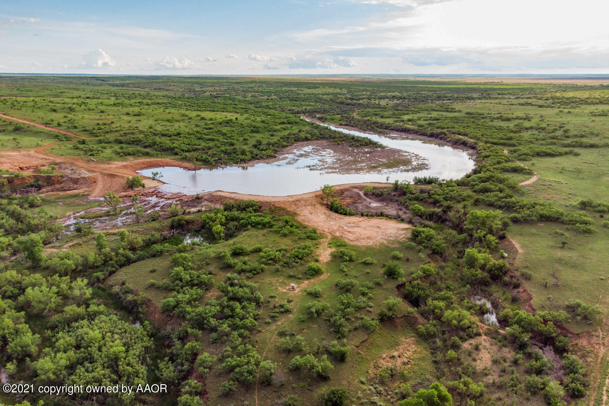Ol' Glory Ranch Matador, TX 79244 - Photo 59 of 59 a view of a lake with beach and outdoor space