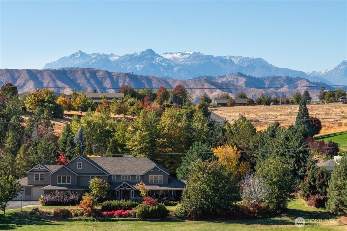 27 Margaret Lane Wenatchee, WA 98801 - Photo 11 of 15 an aerial view of residential houses and trees in the background