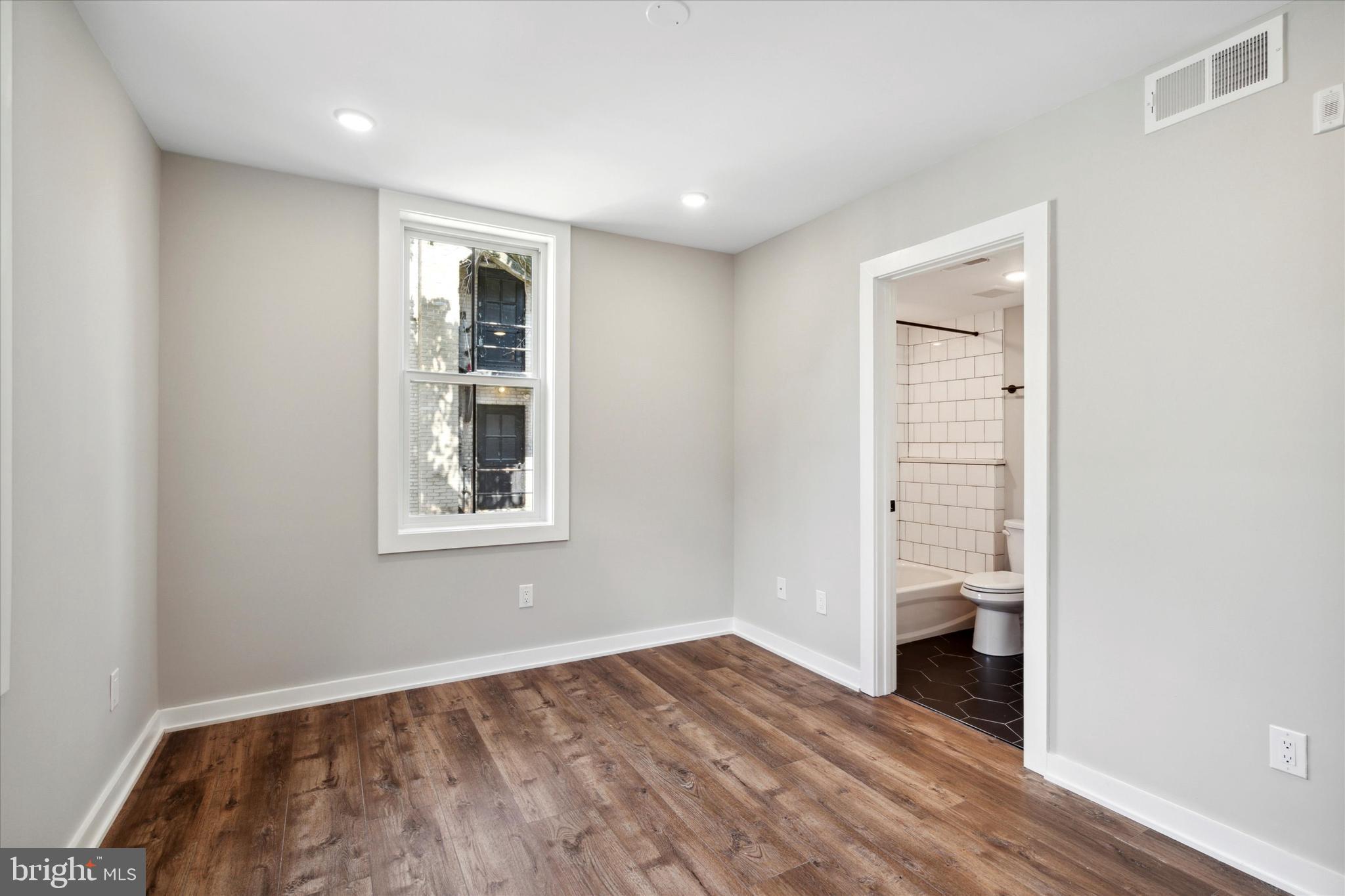 3519 Hamilton Street, Unit 3 Philadelphia, PA 19104 - Photo 14 of 16 a view of an empty room and window