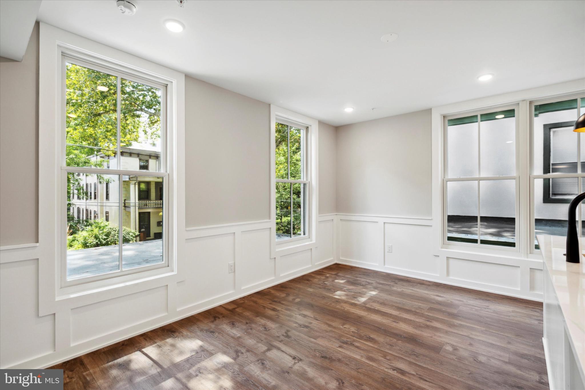 3519 Hamilton Street, Unit 3 Philadelphia, PA 19104 - Photo 8 of 16 a view of a kitchen with wooden floor and a window
