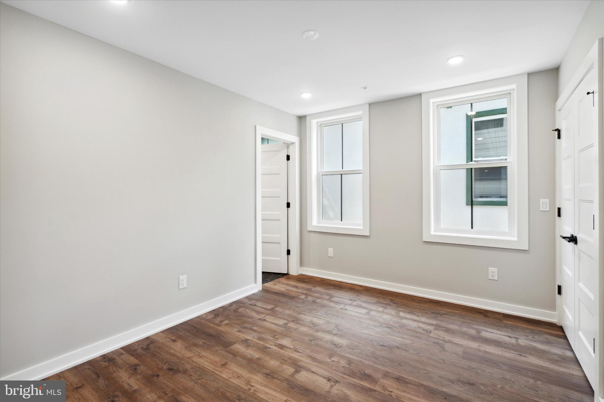 3519 Hamilton Street, Unit 3 Philadelphia, PA 19104 - Photo 9 of 16 a view of wooden floor and windows in a room