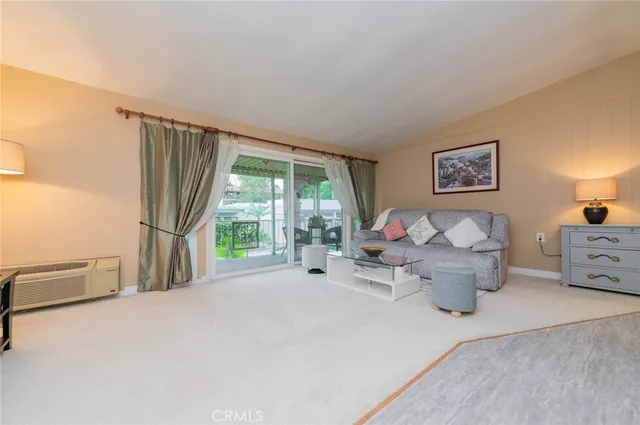 a bed room with furniture and a window