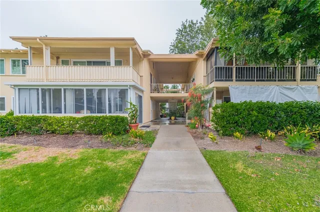 a view of a chairs and table in the patio