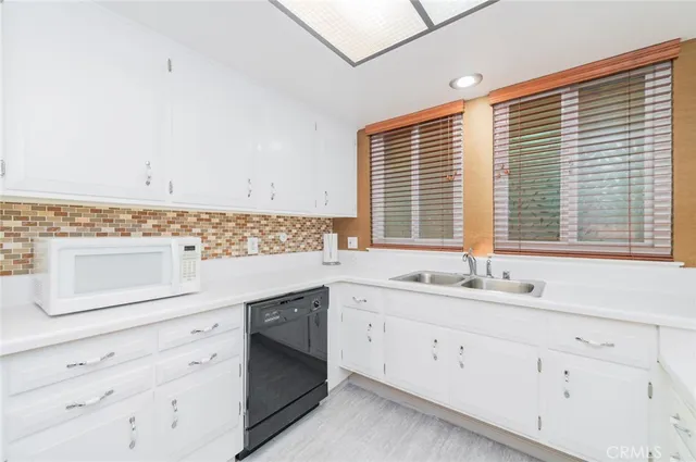 a bed room with a bed and a window