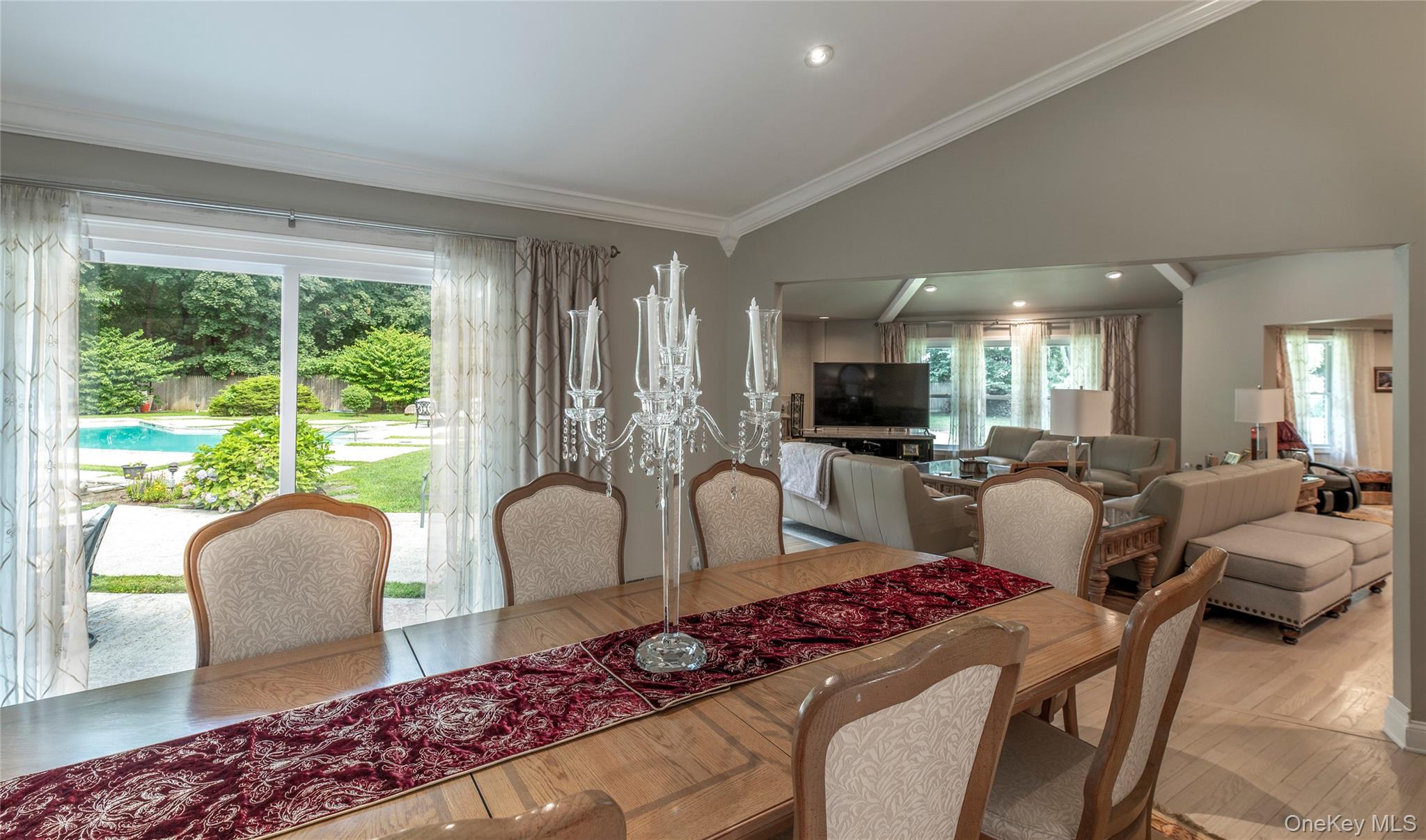 369 Phillips Hill Road New City, NY 10956 - Photo 18 of 40 Dining area featuring ornamental molding, wood finished floors, recessed lighting, and high vaulted ceiling