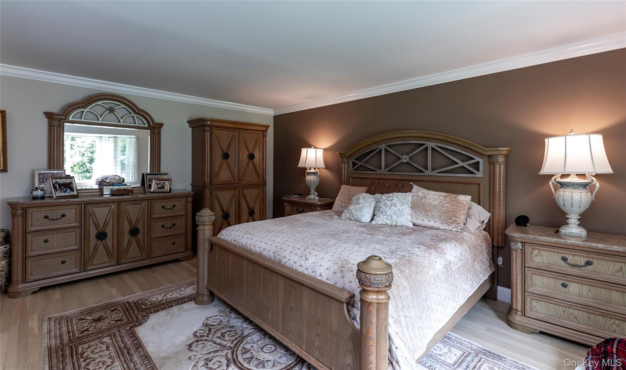 369 Phillips Hill Road New City, NY 10956 - Photo 23 of 40 Bedroom featuring crown molding and light wood finished floors