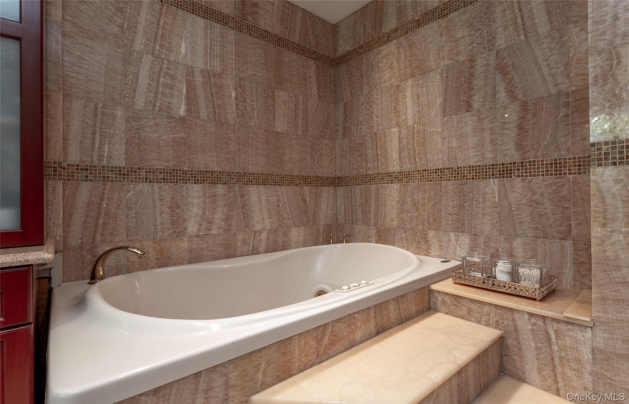 369 Phillips Hill Road New City, NY 10956 - Photo 25 of 40 Full bath with tile walls and a whirlpool tub