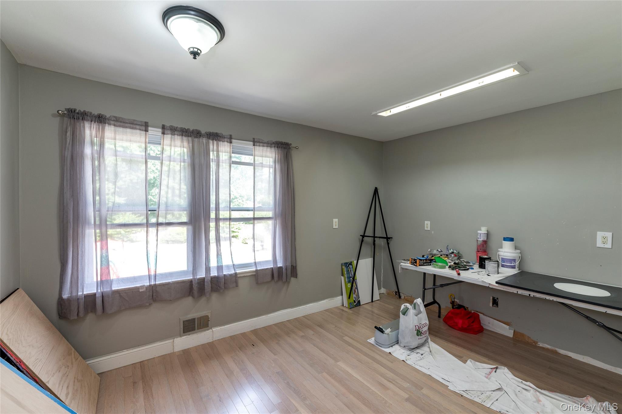 369 Phillips Hill Road New City, NY 10956 - Photo 28 of 40 Misc room featuring wood finished floors and baseboards