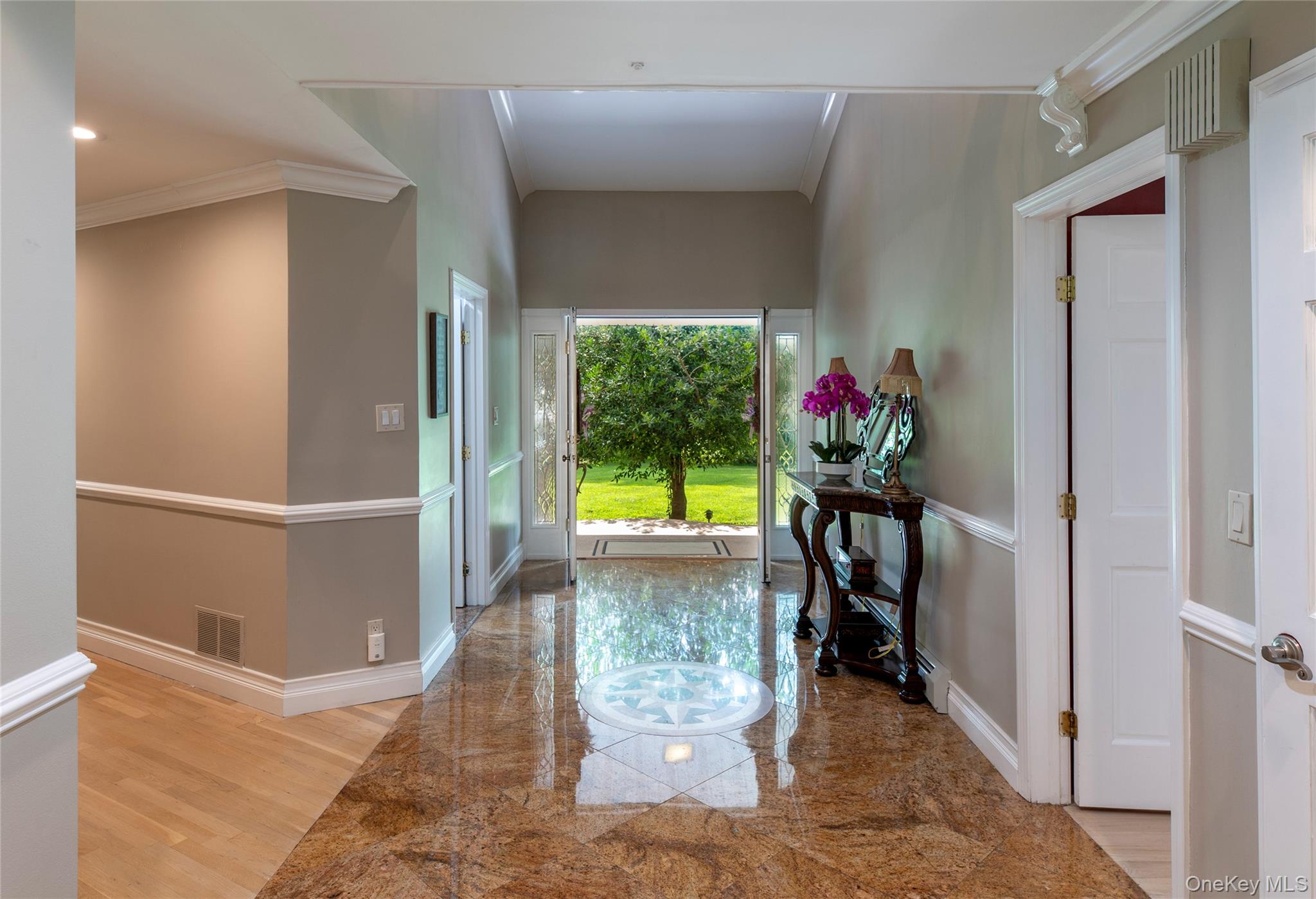 369 Phillips Hill Road New City, NY 10956 - Photo 5 of 40 Foyer entry with ornamental molding and light wood-style flooring