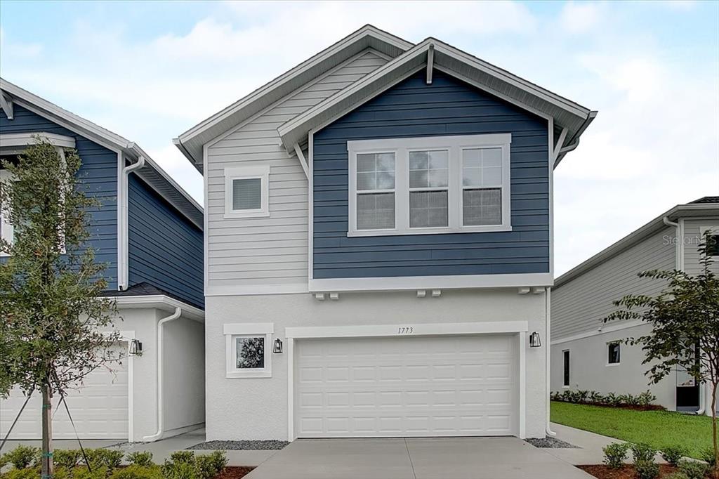 Front Exterior Example *Home under construction, photo is of similar home, paint colors may vary*