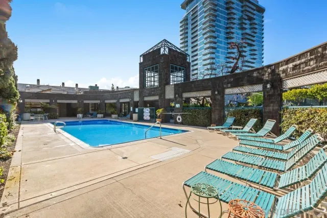 a view of pool with outdoor seating
