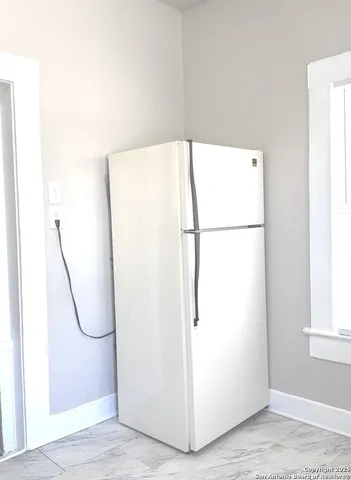 a view of a storage & utility room with washer and dryer