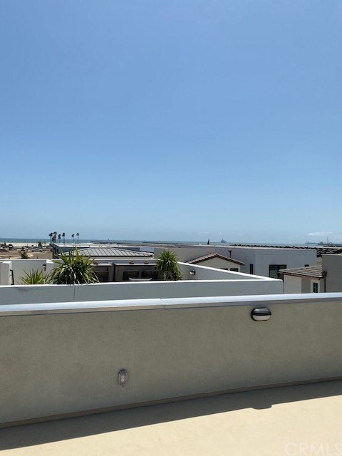 207 1st Street Seal Beach, CA 90740 - Photo 7 of 8 a view of room with wooden floor
