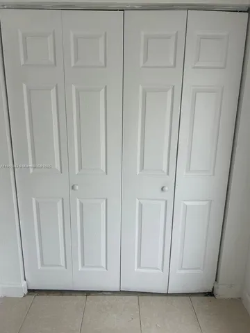 a view of door with hallway