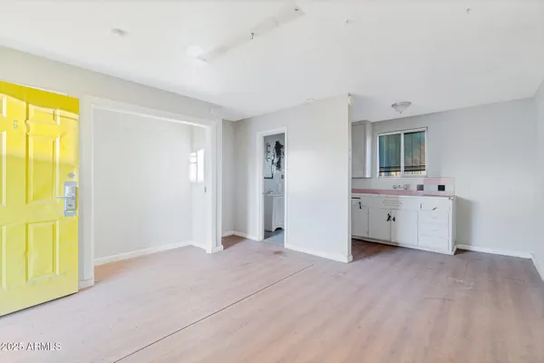 an empty room with windows