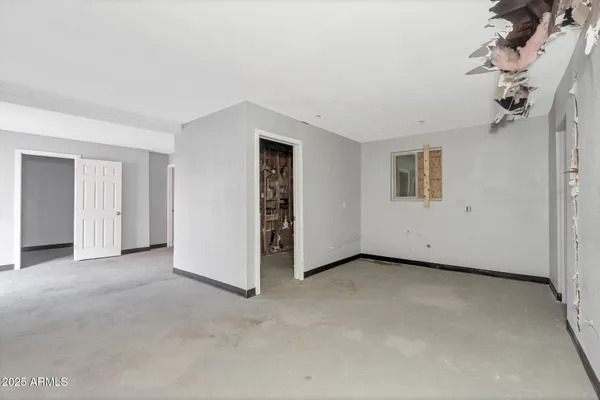 an empty room with windows