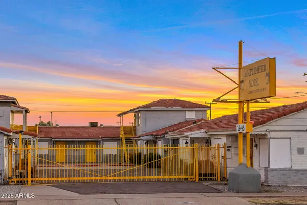 a view of a car park in front of house