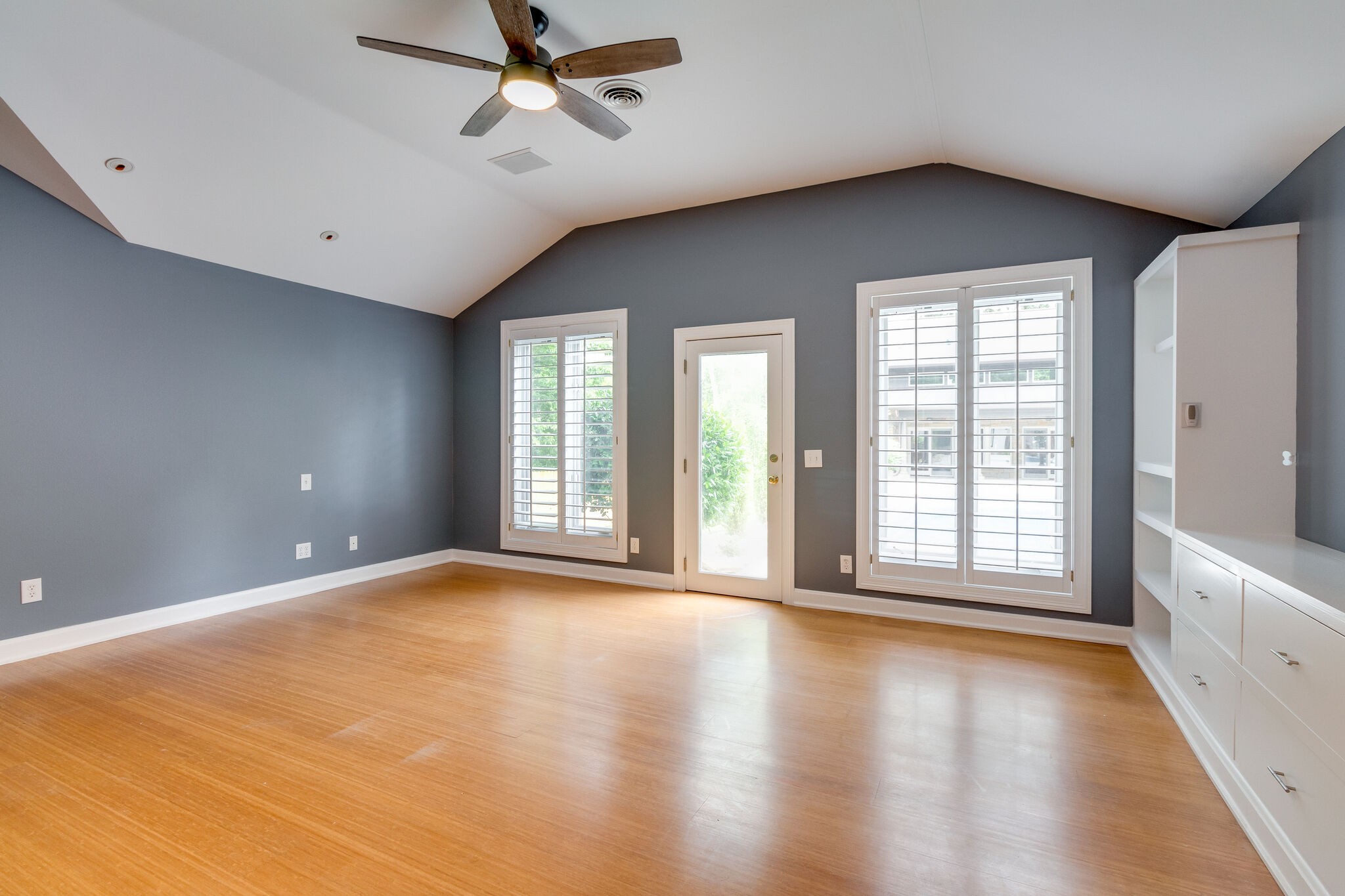 4036 Sneed Road Nashville, TN 37215 - Photo 13 of 24 a view of an empty room with a window and wooden floor