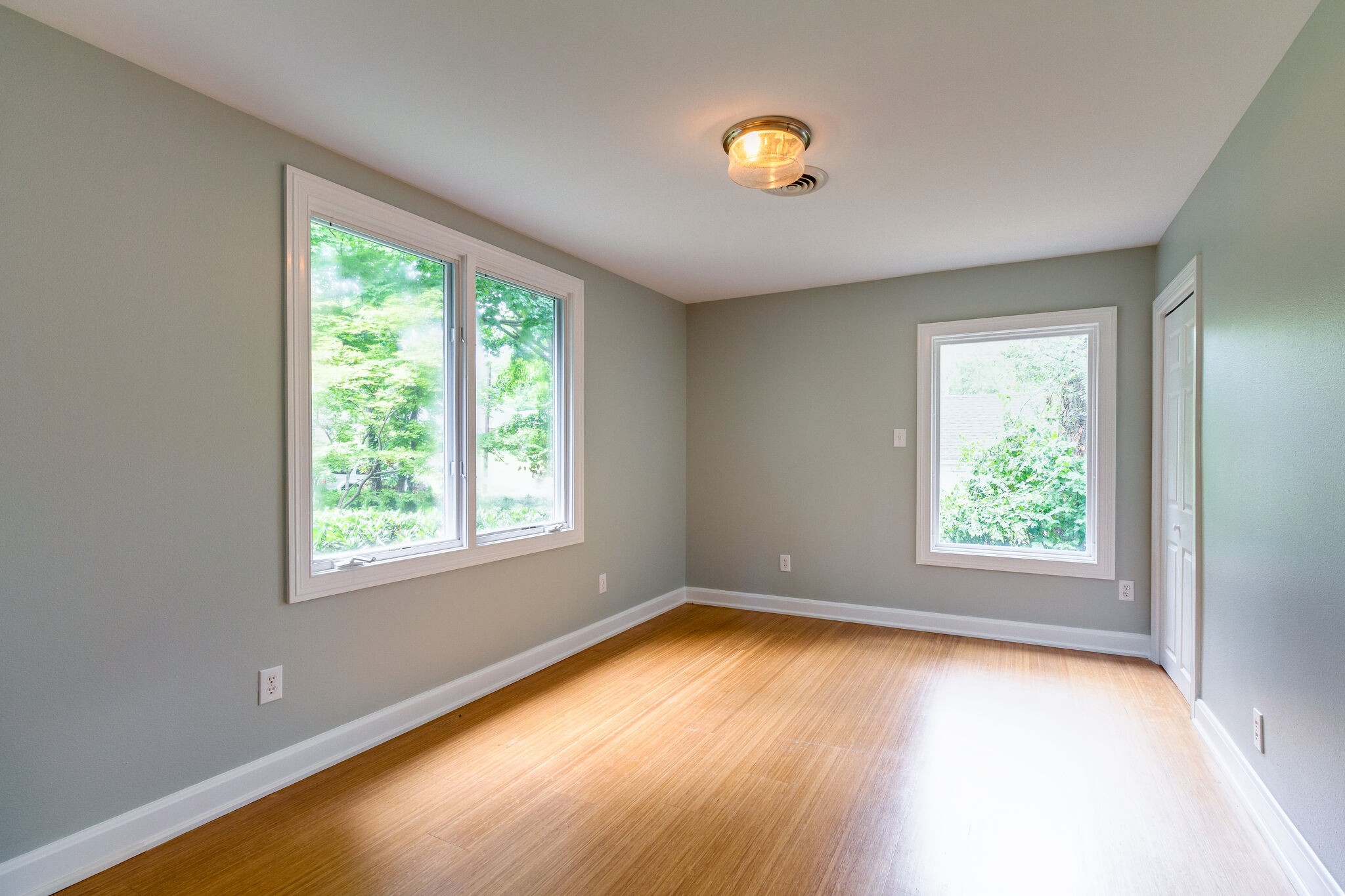 4036 Sneed Road Nashville, TN 37215 - Photo 16 of 24 a view of an empty room with wooden floor and a window