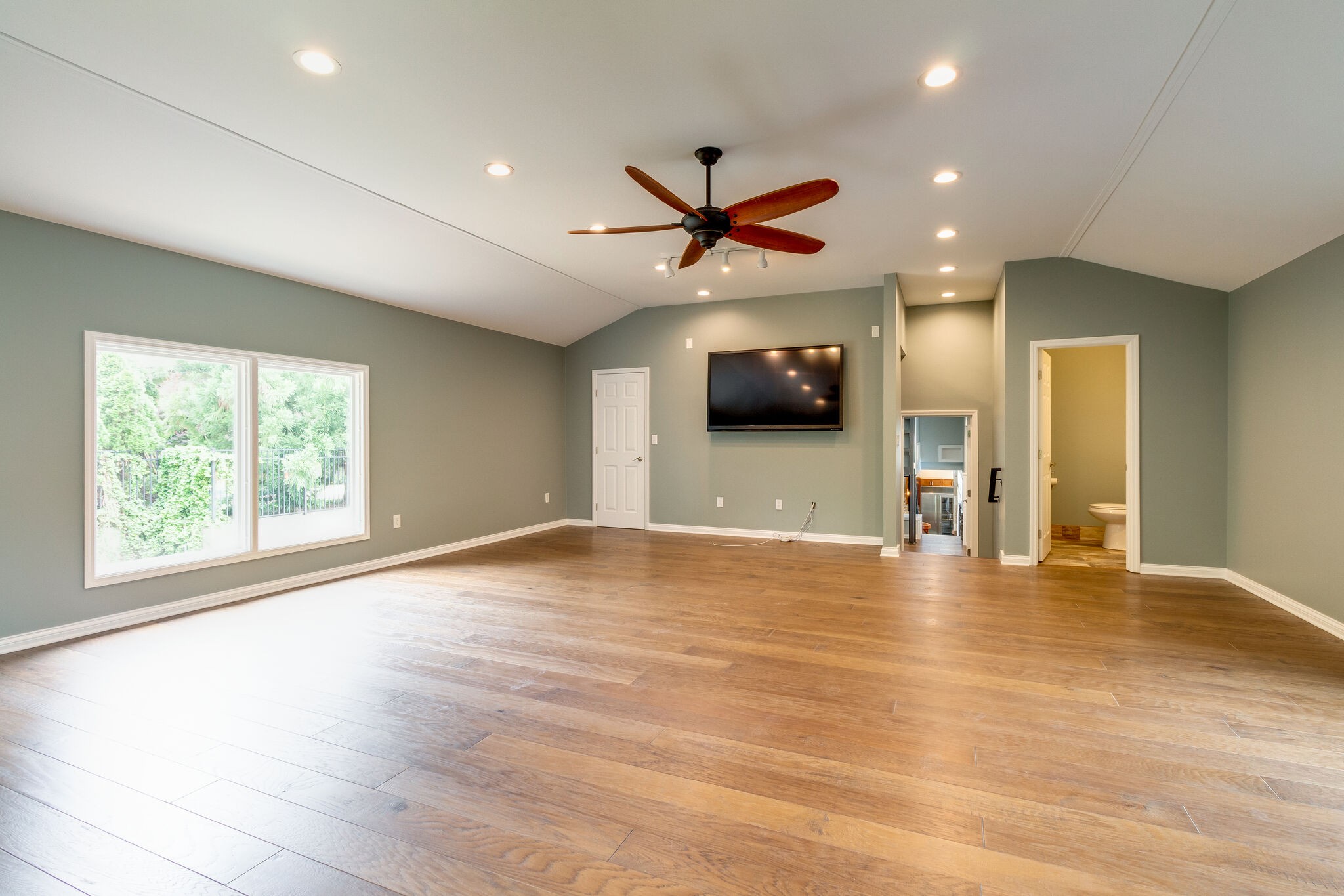 4036 Sneed Road Nashville, TN 37215 - Photo 17 of 24 a view of empty room with wooden floor and window
