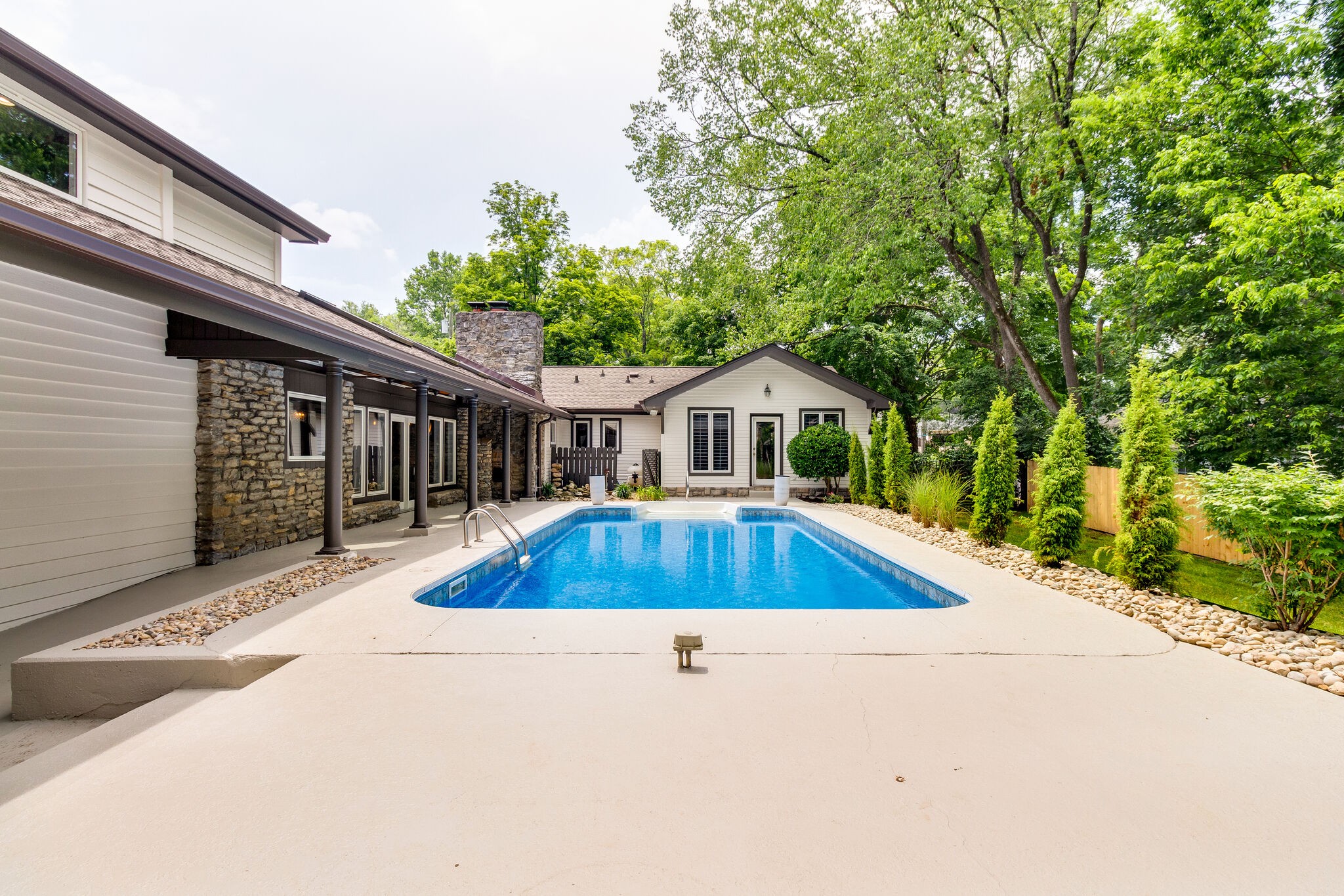 4036 Sneed Road Nashville, TN 37215 - Photo 21 of 24 a view of house with swimming pool outdoor seating