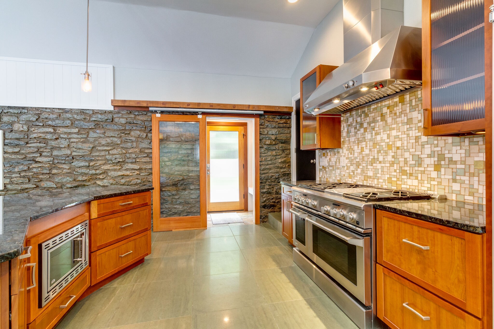 4036 Sneed Road Nashville, TN 37215 - Photo 3 of 24 a kitchen with stainless steel appliances granite countertop a stove and a refrigerator